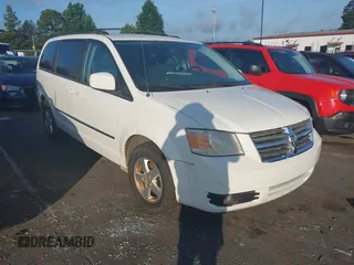 2010 Dodge Grand Caravan SXT z VIN 2D4RN5D10AR200217, wystawiony jako IAAI lot #42540925 z przebiegiem 239 247 mil mil oraz . Historia ofert i sprzedaży dostępna na DreamBid. Obrazek 1.