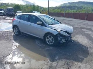 2012 Ford Focus SE z VIN 1FAHP3K27CL241013, wystawiony jako IAAI lot #42198812 z przebiegiem 121 888 mil mil oraz . Historia ofert i sprzedaży dostępna na DreamBid. Obrazek 1.