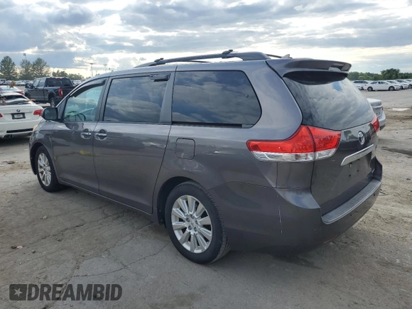 2011 Toyota Sienna XLE AAS with VIN 5TDYK3DC5BS010512, listed as a Copart auction lot 58614775 with 215,020 mi miles and Clean title. Bid and sale history available at DreamBid. Image 2.