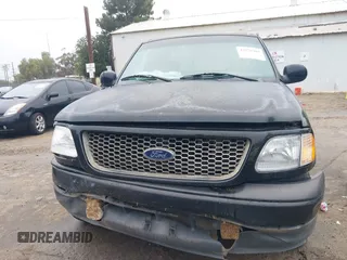 2001 Ford F-150 XL z VIN 1FTRX17L81NB78221, wystawiony jako IAAI lot #41571965 z przebiegiem 171 094 mil mil oraz . Historia ofert i sprzedaży dostępna na DreamBid. Obrazek 12.