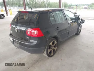 2009 Volkswagen Rabbit S z VIN WVWDB71K59W138874, wystawiony jako IAAI lot #42421953 z przebiegiem 134 616 mil mil oraz . Historia ofert i sprzedaży dostępna na DreamBid. Obrazek 4.
