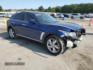 2015 Infiniti QX70 z VIN JN8CS1MU2FM380734, wystawiony jako Copart lot #76012944 z przebiegiem 173 813 mil mil oraz Szkoda całkowita • Salvage title. Historia ofert i sprzedaży dostępna na DreamBid. Obrazek 4.