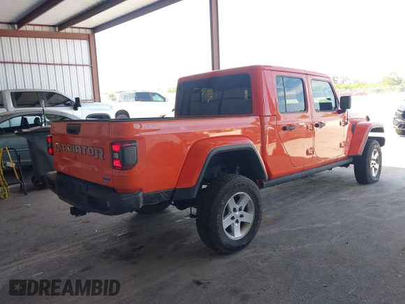 2020 Jeep Gladiator Overland z VIN 1C6HJTFG4LL154369, wystawiony jako IAAI lot #42681844 z przebiegiem 76 374 mil mil oraz . Historia ofert i sprzedaży dostępna na DreamBid. Obrazek 4.