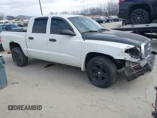 2006 Dodge Dakota SLT with VIN 1D7HW48N96S716133, listed as a IAAI auction lot 41701568 with 164,971 mi miles. Bid and sale history available at carsss.com. Image 1.
