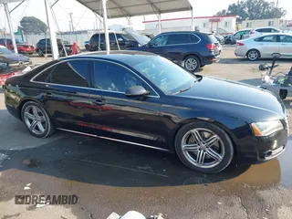 2011 Audi A8 with VIN WAUAVAFD6BN023937, listed as a IAAI auction lot 41288464 with 158,127 mi miles and . Bid and sale history available at DreamBid. Image 13.