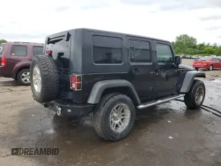2008 Jeep Wrangler Unlimited Rubicon with VIN 1J4GA691X8L590979, listed as a Copart auction lot 57840575 with 195,458 mi miles and Salvage title. Bid and sale history available at DreamBid. Image 3.