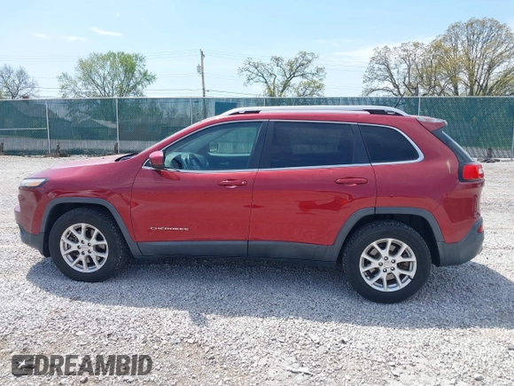2014 Jeep Cherokee Altitude with VIN 1C4PJMCB7EW185958, listed as a IAAI auction lot 42002583 with 118,256 mi miles and . Bid and sale history available at DreamBid. Image 14.