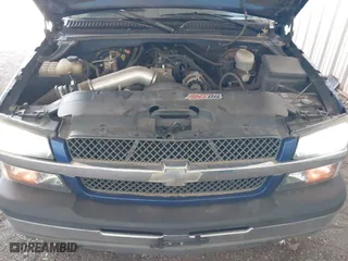 2003 Chevrolet Silverado 1500 with VIN 2GCEC19T731227114, listed as a IAAI auction lot 41858802 with 60,815 mi miles. Bid and sale history available at carsss.com. Image 10.