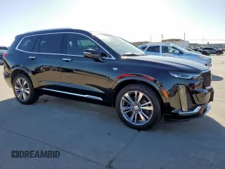 2020 Cadillac XT6 FWD Premium Luxury z VIN 1GYKPCRS7LZ131298, wystawiony jako Copart lot #50196605 z przebiegiem 63 320 mil mil oraz Czysty tytuł • Clean title. Historia ofert i sprzedaży dostępna na DreamBid. Obrazek 4.
