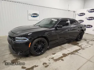 2020 Dodge Charger SXT z VIN 2C3CDXBGXLH108120, wystawiony jako Copart lot #60300865 z przebiegiem 143 691 mil mil oraz Czysty tytuł • Clean title. Historia ofert i sprzedaży dostępna na DreamBid. Obrazek 1.