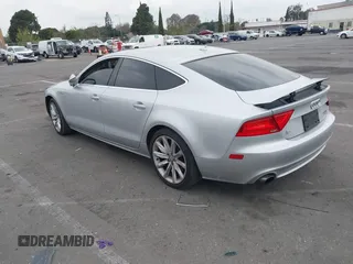 2013 Audi A7 3.0 Premium Plus with VIN WAUYGAFC7DN076830, listed as a IAAI auction lot 41447727 with 107,517 mi miles. Bid and sale history available at carsss.com. Image 3.