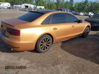 2011 Audi A8 с VIN WAURVAFD3BN013482, выставлен на аукционе IAAI как лот 42109455 с пробегом 179 818 миль миль и . История ставок и продаж доступна на DreamBid. Изображение 4.