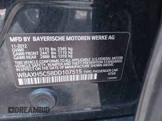 2013 BMW 5 Series 528i xDrive with VIN WBAXH5C58DD107515, listed as a IAAI auction lot 41673214 with 115,726 mi miles. Bid and sale history available at carsss.com. Image 9.