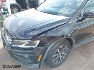 2019 Volkswagen Tiguan SE with VIN 3VV3B7AXXKM012766, listed as a IAAI auction lot 41571347 with 56,594 mi miles. Bid and sale history available at carsss.com. Image 6.