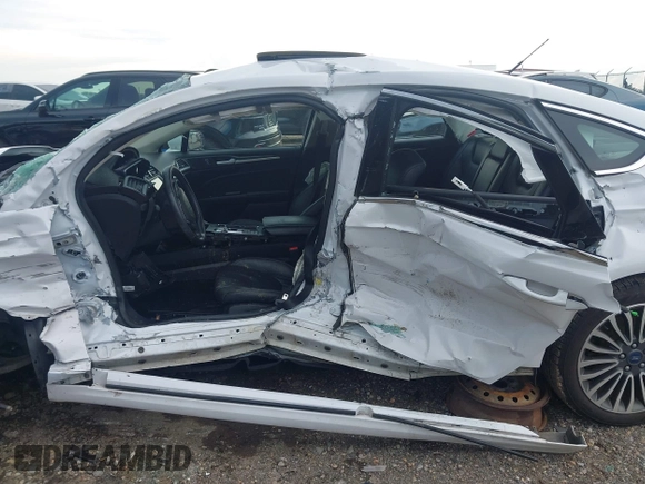 2018 Ford Fusion Titanium with VIN 3FA6P0RU9JR206923, listed as a IAAI auction lot 42522204 with Not provided miles and . Bid and sale history available at DreamBid. Image 14.