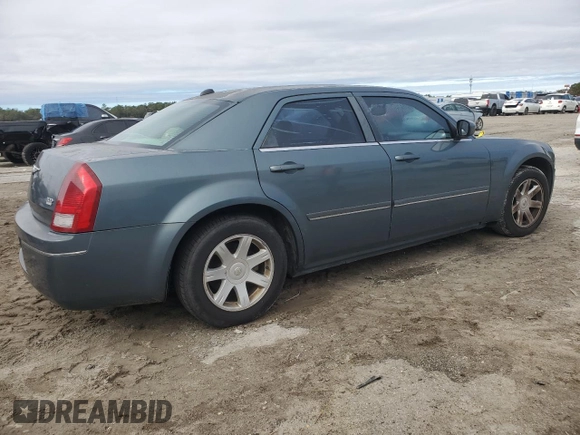2005 Chrysler 300 with VIN 2C3JA53G65H651700, listed as a Copart auction lot 41861225 with 247,771 mi miles and Salvage Title. Bid and sale history available at carsss.com. Image 3.