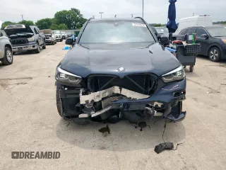 2023 BMW X5 sDrive40i with VIN 5UXCR4C07P9N48328, listed as a Copart auction lot 57619515 with 32,174 mi miles and Salvage title. Bid and sale history available at DreamBid. Image 5.