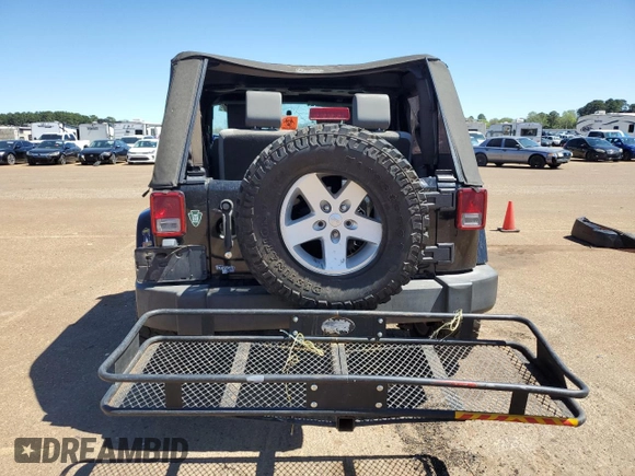 2007 Jeep Wrangler Sahara z VIN 1J4FA54177L183617, wystawiony jako Copart lot #49660785 z przebiegiem 178 846 mil mil oraz Szkoda całkowita • Salvage title. Historia ofert i sprzedaży dostępna na DreamBid. Obrazek 6.