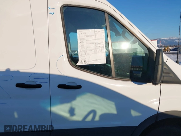 2023 Ford Transit Cargo with VIN 1FTBR1C81PKA63841, listed as a IAAI auction lot 41582275 with 33,915 mi miles and . Bid and sale history available at DreamBid. Image 14.