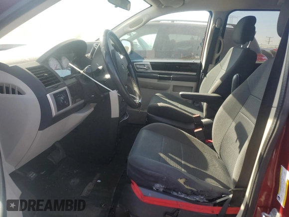 2010 Dodge Grand Caravan Crew with VIN 2D4RN6DX0AR438059, listed as a Copart auction lot 46850575 with 137,665 mi miles and Salvage Title. Bid and sale history available at DreamBid. Image 7.
