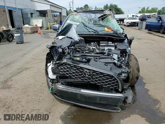 2023 Toyota Corolla Cross XLE with VIN 7MUDAABG4PV070998, listed as a Copart auction lot 56869585 with Not provided miles and Non repairable. Bid and sale history available at DreamBid. Image 13.