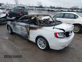2016 BMW 2 Series 228i xDrive with VIN WBA1L9C56GV325558, listed as a IAAI auction lot 41833671 with 1 mi miles. Bid and sale history available at carsss.com. Image 3.