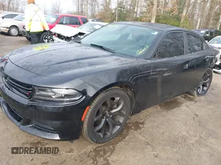 2020 Dodge Charger SXT with VIN 2C3CDXBG0LH237970, listed as a IAAI auction lot 41088945 with 106,674 mi miles and . Bid and sale history available at DreamBid. Image 18.