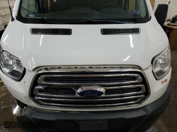 2018 Ford Transit Passenger XL z VIN 1FBZX2YGXJKB06482, wystawiony jako Copart lot #86589674 z przebiegiem 106 039 mil mil oraz Szkoda całkowita • Salvage title. Historia ofert i sprzedaży dostępna na DreamBid. Obrazek 12.