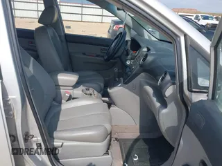 2007 Kia Rondo LX with VIN KNAFG526077069189, listed as a IAAI auction lot 42090474 with 96,722 mi miles. Bid and sale history available at carsss.com. Image 5.