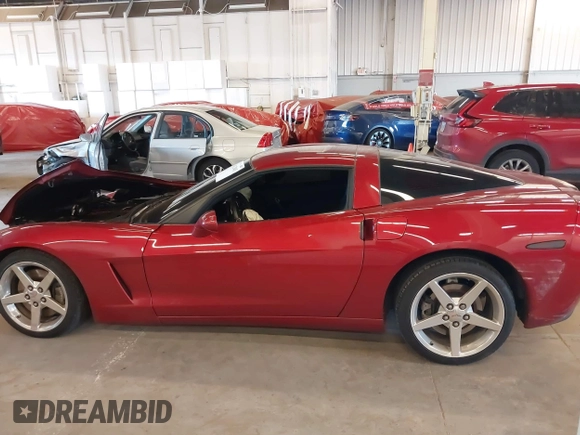 2005 Chevrolet Corvette with VIN 1G1YY24U755114259, listed as a IAAI auction lot 41312843 with 57,254 mi miles. Bid and sale history available at carsss.com. Image 15.