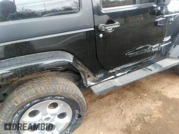 2014 Jeep Wrangler Sahara with VIN 1C4AJWBG9EL161712, listed as a IAAI auction lot 41839193 with 68,318 mi miles and . Bid and sale history available at DreamBid. Image 17.