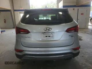 2017 Hyundai Santa Fe 2.4L z VIN 5XYZTDLB4HG440683, wystawiony jako Copart lot #55408975 z przebiegiem 105 014 mil mil oraz Szkoda całkowita • Salvage title. Historia ofert i sprzedaży dostępna na DreamBid. Obrazek 6.