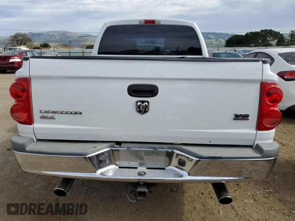 2005 Dodge Dakota SLT with VIN 1D7HE48N35S263600, listed as a Copart auction lot 46705555 with 128,519 mi miles and Salvage Title. Bid and sale history available at DreamBid. Image 6.