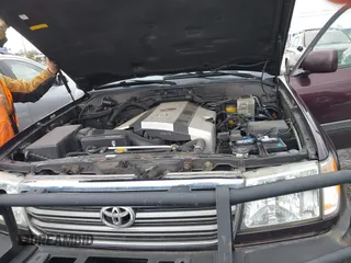 2004 Toyota Land Cruiser with VIN JTEHT05J242066695, listed as a IAAI auction lot 41725358 with 226,895 mi miles. Bid and sale history available at carsss.com. Image 10.