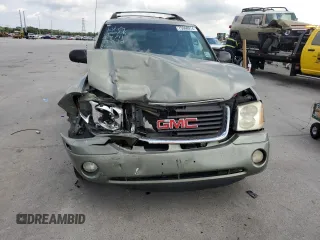 2003 GMC Envoy SLE with VIN 1GKES16P636242632, listed as a Copart auction lot 75960974 with Not Provided miles and Salvage Title. Bid and sale history available at DreamBid. Image 5.