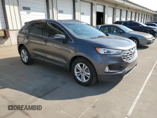 2020 Ford Edge SEL с VIN 2FMPK3J97LBB58552, выставлен на аукционе Copart как лот 58472995 с пробегом 71 387 миль миль и Списание • Salvage title. История ставок и продаж доступна на DreamBid. Изображение 4.