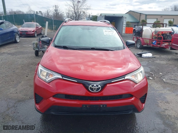 2016 Toyota RAV4 LE with VIN JTMBFREV2GJ097058, listed as a IAAI auction lot 41720372 with 118,606 mi miles. Bid and sale history available at carsss.com. Image 13.