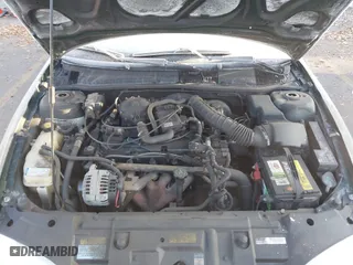 2001 Chevrolet Cavalier with VIN 3G1JC52461S218469, listed as a IAAI auction lot 41000056 with 114,181 mi miles. Bid and sale history available at carsss.com. Image 10.