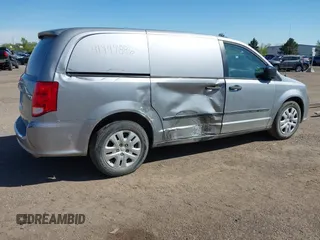 2014 Ram Cargo Van with VIN 2C4RRGAG9ER312915, listed as a IAAI auction lot 41947886 with 149,144 mi miles and . Bid and sale history available at DreamBid. Image 4.