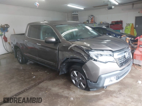 2020 Honda Ridgeline RTL-E with VIN 5FPYK3F75LB001516, listed as a IAAI auction lot 41605859 with 93,902 mi miles and . Bid and sale history available at DreamBid. Image 1.