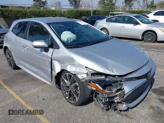 2019 Toyota Corolla Hatchback SE with VIN JTNK4RBE9K3031173, listed as a IAAI auction lot 41533989 with 61,309 mi miles. Bid and sale history available at carsss.com. Image 1.