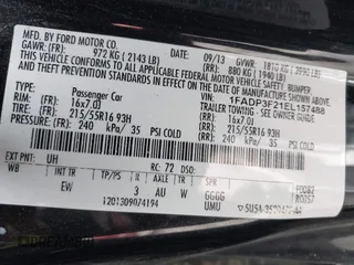 2014 Ford Focus SE with VIN 1FADP3F21EL157488, listed as a IAAI auction lot 42120325 with 198,658 mi miles and . Bid and sale history available at DreamBid. Image 9.