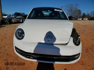2012 Volkswagen Beetle 2.0T Turbo w/Sun/Snd/Nav PZEV with VIN 3VWVA7AT9CM656846, listed as a Copart auction lot 49466825 with 76,362 mi miles and Salvage Title. Bid and sale history available at carsss.com. Image 5.