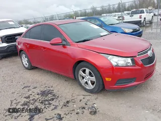 2014 Chevrolet Cruze 1LT with VIN 1G1PC5SB1E7274803, listed as a IAAI auction lot 41897844 with 175,081 mi miles and . Bid and sale history available at DreamBid. Image 1.