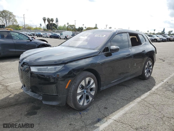 2025 BMW iX xDrive50 with VIN WB523CF00SCT18853, listed as a Copart auction lot 51282705 with 0 mi miles and Salvage Title. Bid and sale history available at carsss.com. Image 1.