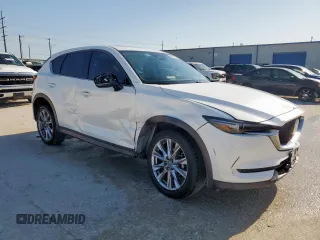 2020 Mazda CX-5 Grand Touring with VIN JM3KFADM7L0804219, listed as a Copart auction lot 51982225 with 56,356 mi miles and Salvage Title. Bid and sale history available at carsss.com. Image 4.
