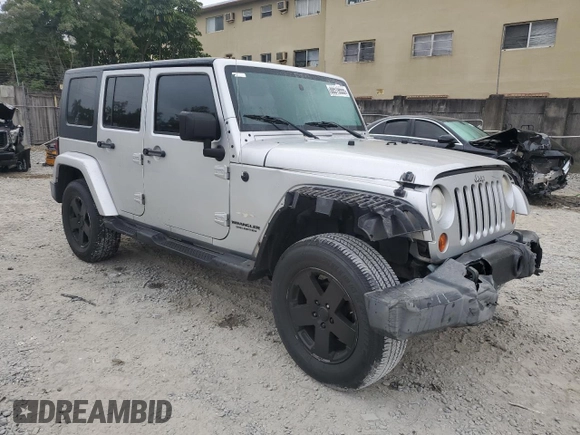 2010 Jeep Wrangler Unlimited Sahara with VIN 1J4BA5H17AL117410, listed as a Copart auction lot 88519555 with 126,471 mi miles and Salvage Title. Bid and sale history available at carsss.com. Image 4.