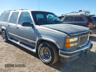1994 GMC Suburban with VIN 1GKEC16K2RJ721119, listed as a IAAI auction lot 41075175 with 344,904 mi miles. Bid and sale history available at carsss.com. Image 1.