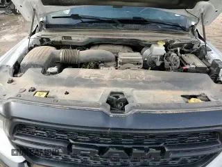 2023 Ram 1500 Big Horn z VIN 1C6SRFFT3PN594090, wystawiony jako Copart lot #60756155 z przebiegiem 123 151 mil mil oraz Czysty tytuł • Clean title. Historia ofert i sprzedaży dostępna na DreamBid. Obrazek 13.