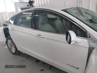 2013 Ford Fusion SE Hybrid with VIN 3FA6P0LU8DR357054, listed as a IAAI auction lot 42372168 with 143,979 mi miles and . Bid and sale history available at DreamBid. Image 13.